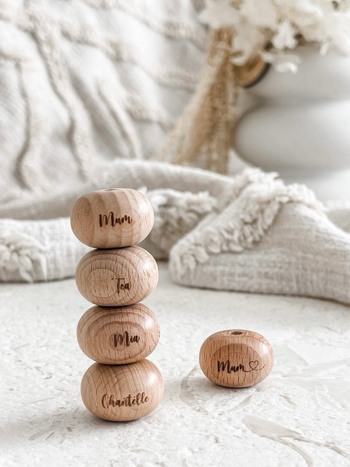 Engraved wooden bead